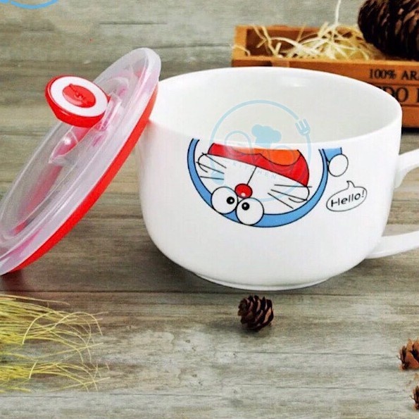 Ca Mì Sứ Có Quai Cầm Kèm Nắp Đậy Chân Không In Hình Ngẫu Nhiên
