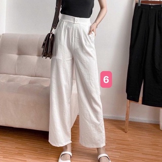 Quần ống rộng đũi lưng thun.