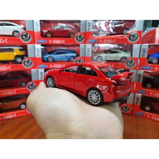 HỘP XE MÔ HÌNH Mitsubishi Lancer Evolution WELLY 1:36 (Đỏ)