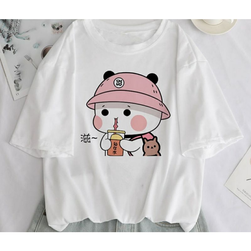Áo tay lỡ form rộng màu trắng họa tiết hoạt hình đáng yêu.