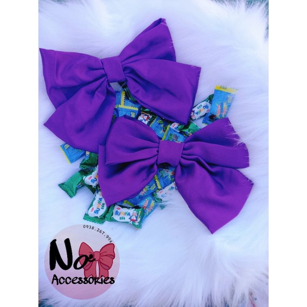 Cột, kẹp nơ màu tím