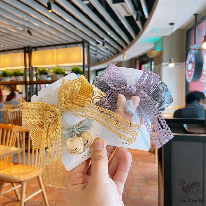 Bộ 2 kẹp tóc đính nơ ren và trang trí nhân vật hoạt hình xinh xắn đáng yêu cho bé gái