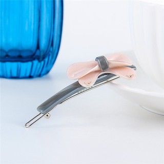 Kẹp tóc mái kiểu xà cừ