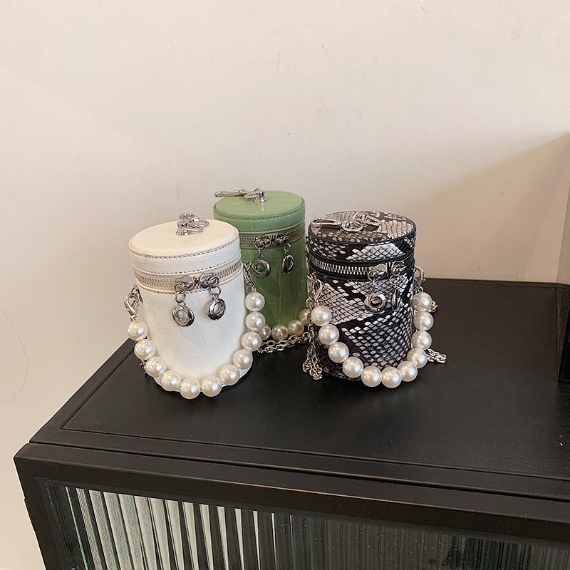 Túi sách, túi trụ da sần nhỏ xinh