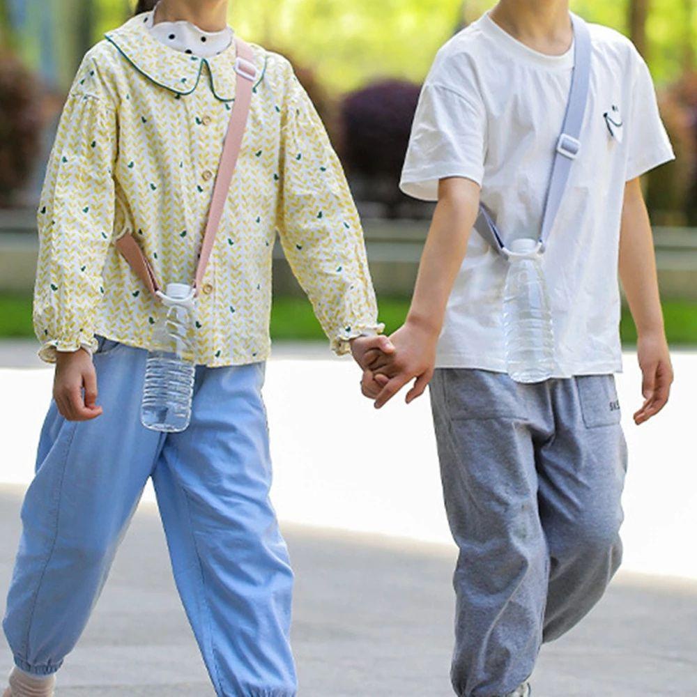 Giá Đỡ Bình Nước Có Dây Đeo Vai Tiện Dụng Khi Đi Du Lịch