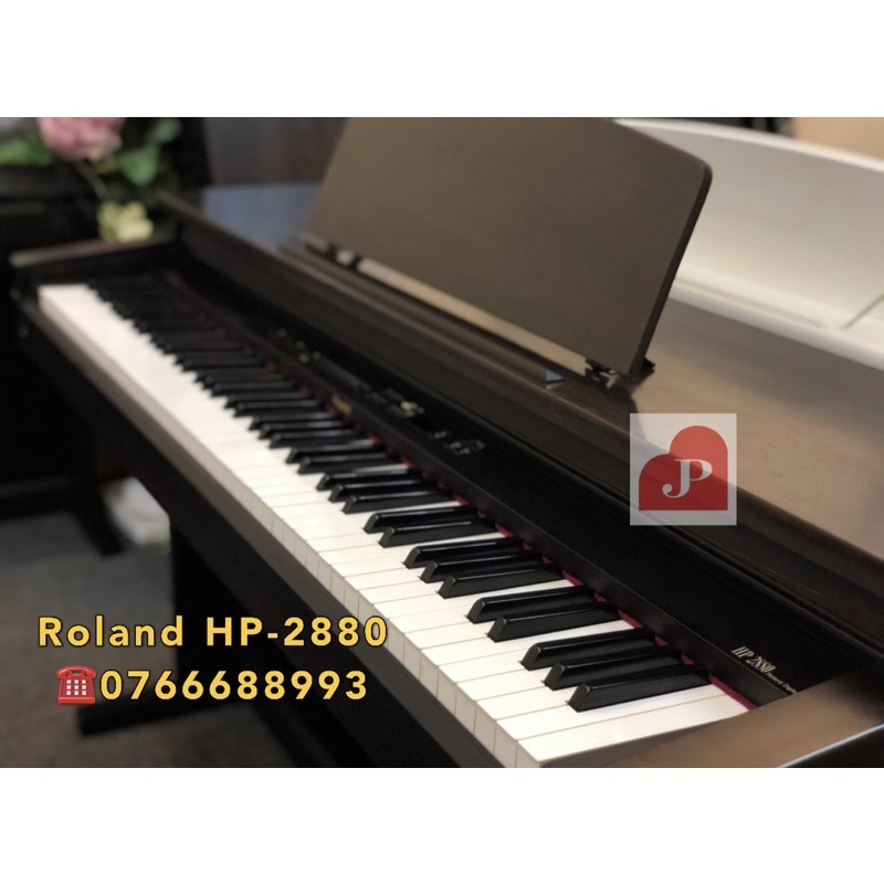 Đàn Piano Roland HP-2880 màu nâu đen kiểu dáng cực đẹp