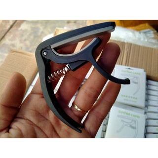 Capo guitar lò xo nhựa ukulele