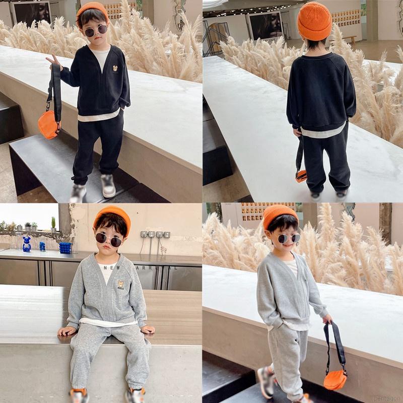 Set đồ thể thao 2 món gồm áo tay dài dáng rộng in hình gấu dễ thương + quần dài cho bé 1-6 tuổi