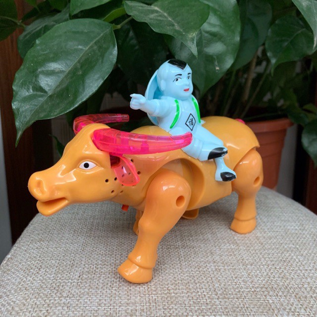 CON TRÂU CHẠY PIN CHO BÉ  -