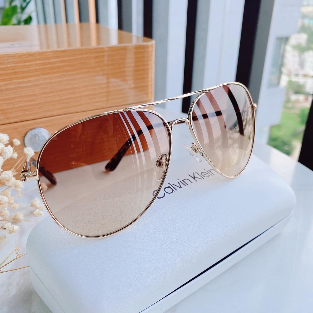 Kính Mát Calvin Klein CK19314S  mắt nâu trà, viền vàng