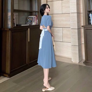 Váy xoè hở lưng thắt nơ