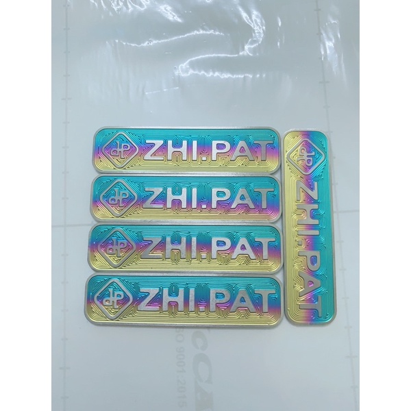 (Giá Đặc Biệt) LôGô Titan ZinPat Có Sẵn Keo 3M Gắn Nhiều Vị Trí Trên Xe