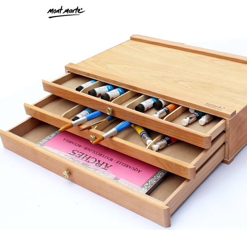 Bàn gỗ Mont Marte kê, đựng giấy, bút chì, màu vẽ và nhiều dụng cụ học tập khác, có 3 tầng ngăn kéo tiện lợi