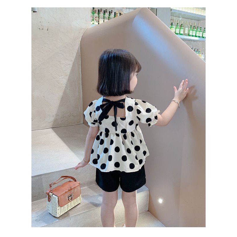 Quần áo trẻ em - Bộ quần áo cho bé gái dáng peplums họa tiết chấm bi  - thời trang trẻ em phong cách Hàn Quốc