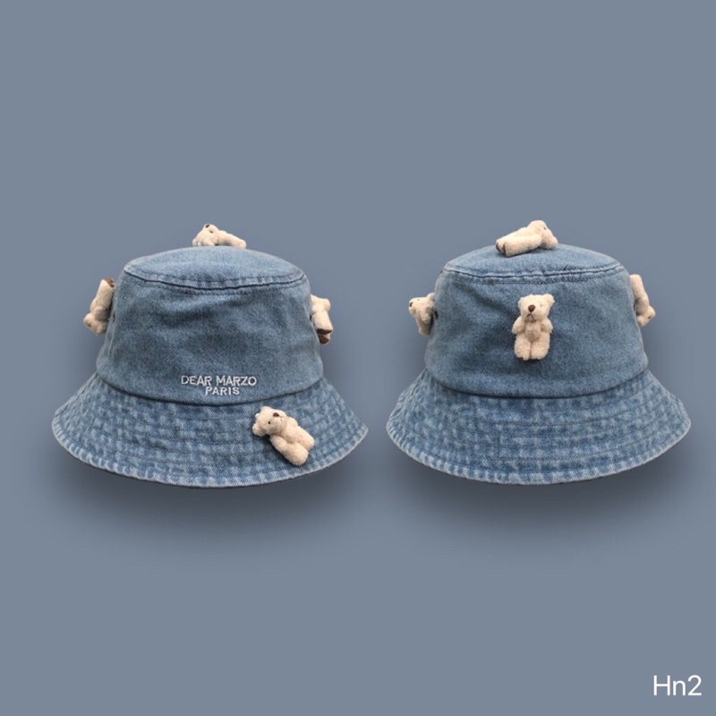 Mũ bucket bò 13de marzo đính gấu bông mai phương bùi