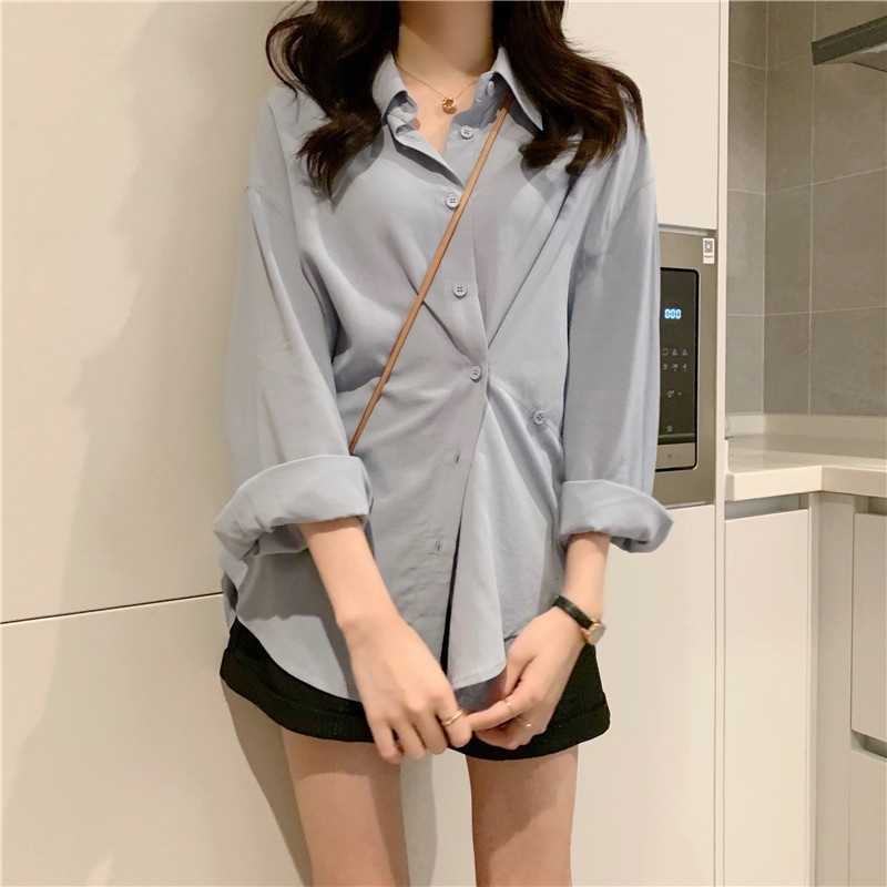 Áo sơ mi nữ kẻ sọc dài tay áo kiểu cổ bẻ vintage công sở form rộng basic vạt lệch phong cách Hàn Quốc DK1T401