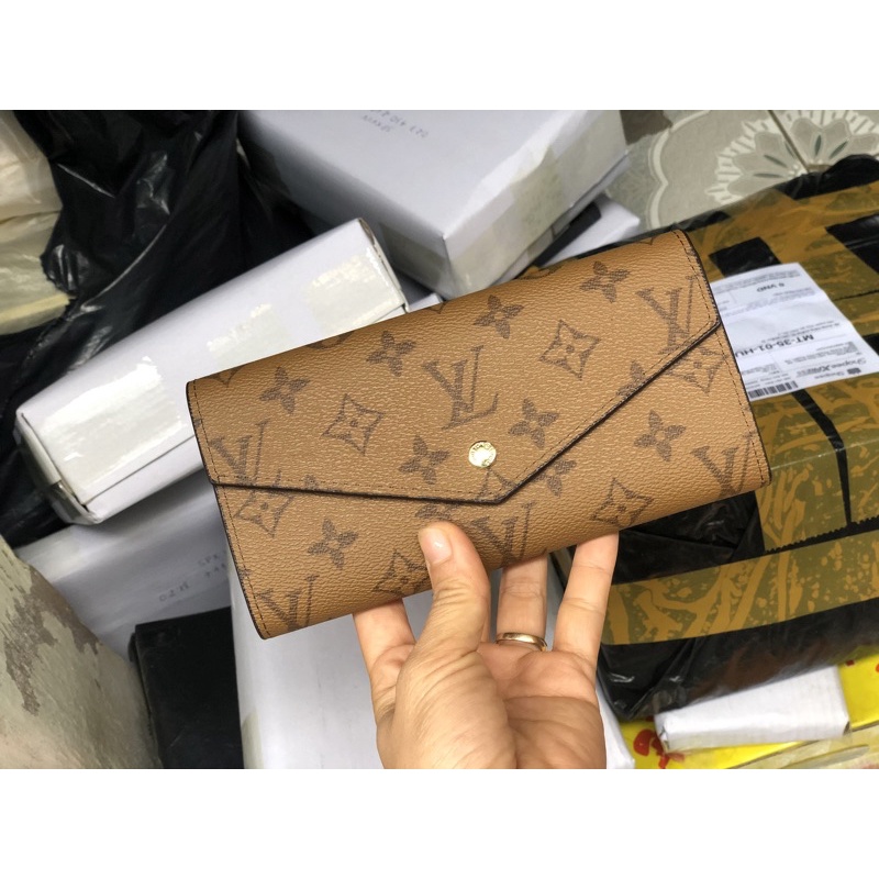 Ví cầm tay LV chất xịn full box full logo