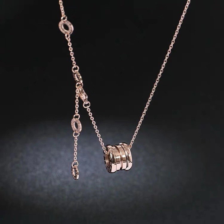 Vòng cổ ngắn bằng thép titanium 316l màu vàng mặt hình lò xo có thể thu gọn độc đáo cho nam và nữ