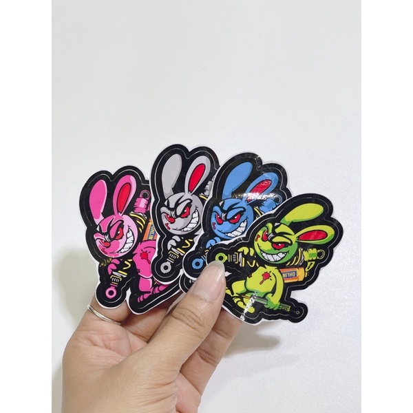 Tem dán hình thỏ điên cầm phuộc Olin, thỏ tay cầm trợ lực kích thước 6x5cm có sẵn keo dán