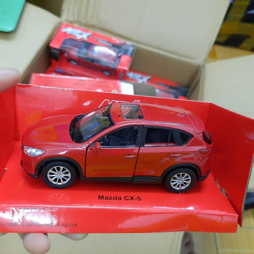 Xe ô tô Mazda CX5 Mô hình tỉ lệ 1:36 xe bằng sắt chạy cót mở 2 cửa trước