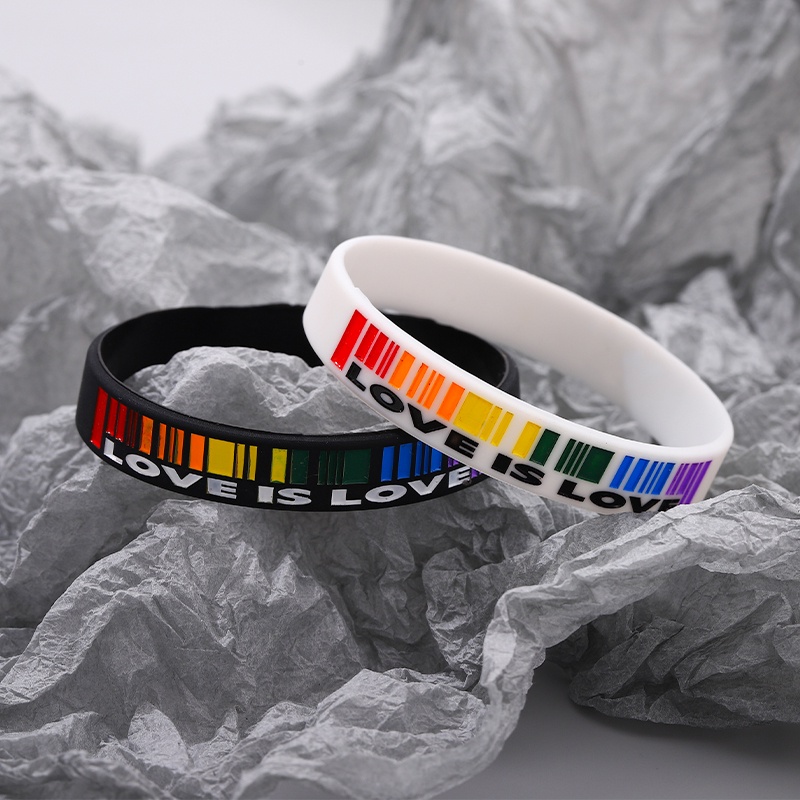 Vòng Tay Cặp Bằng Cao Su Mềm Màu Trắng Đen In Chữ LOVE IS LOVE