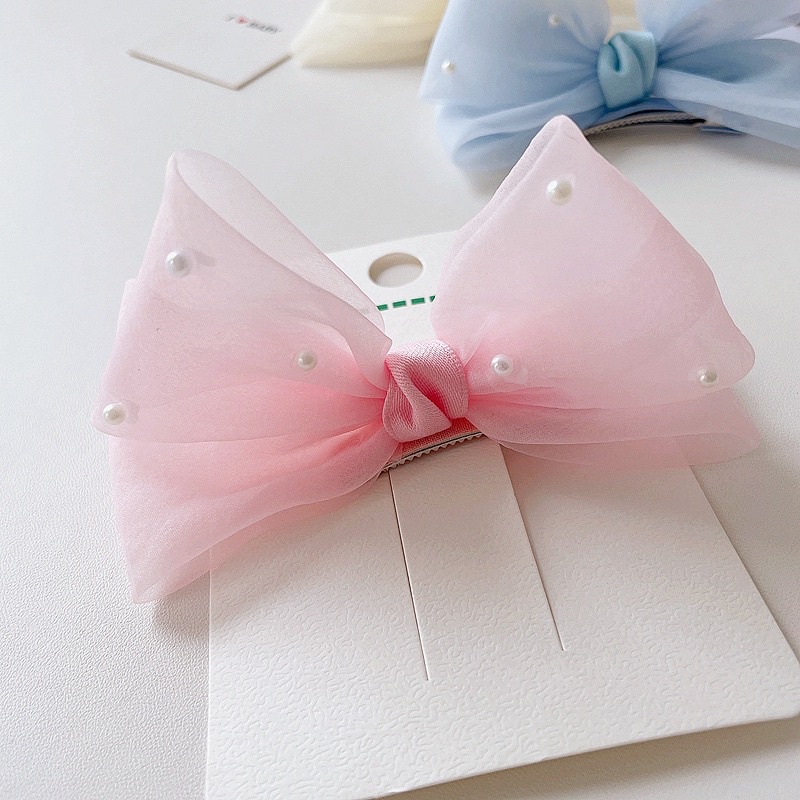 Nơ voan đính hạt dáng 3D màu pastel xinh xinh cho bé