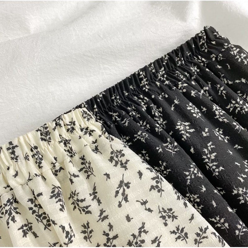 [Quà tặng là dây chun buộc tóc nữ] Chân váy midi hoa nhí 2 màu đen trắng phong cách ulzzang Lucy Outfit thiết kế | BigBuy360 - bigbuy360.vn