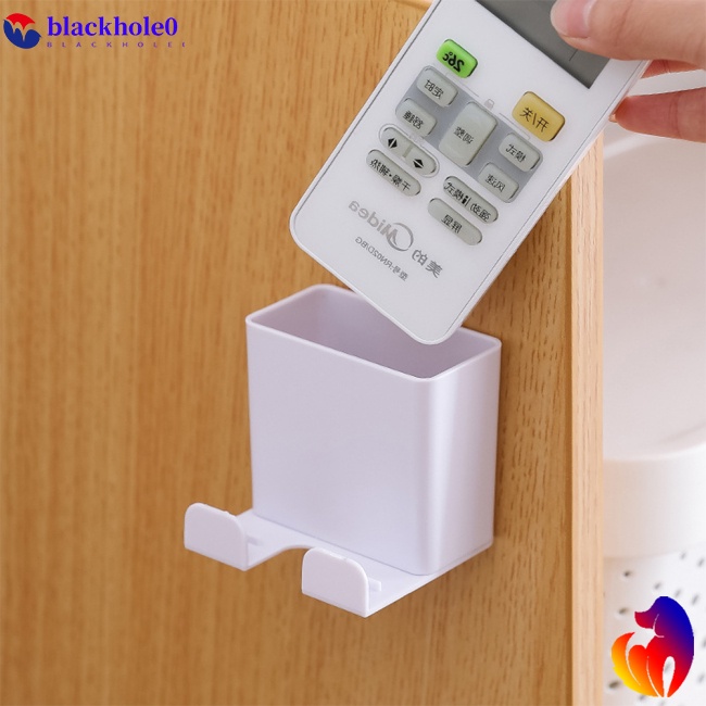 Hộp đựng điều khiển từ xa máy lạnh nhét phích cắm điện thoại treo tường