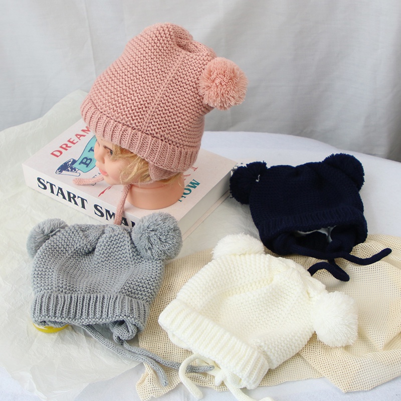 Mũ dệt kim mềm mại thiết kế hình tai thỏ phối quả bóng lông xù ấm áp màu trơn thiết kế dễ thương cho bé