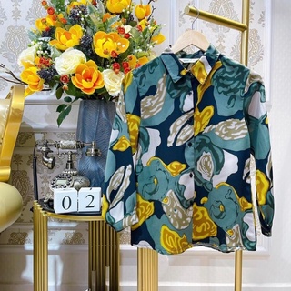 Áo hoạ tiết hoa xanh