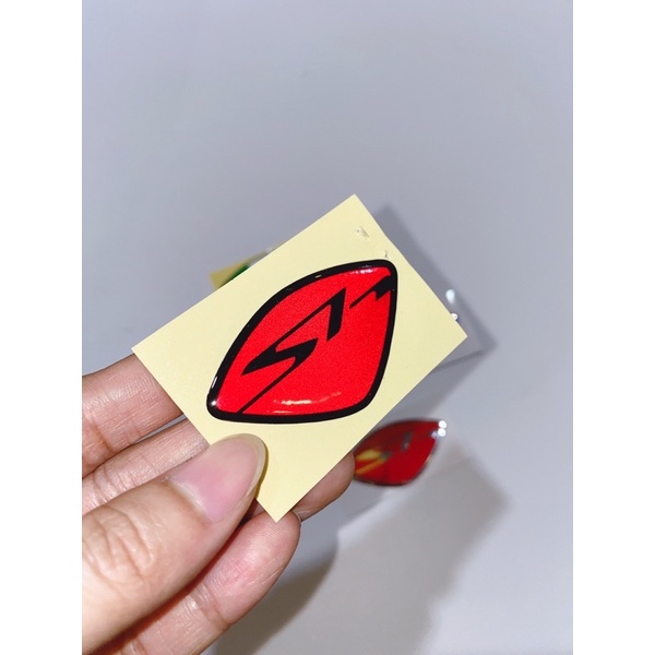 Decal tem dán mặt nạ logo nổi chữ SH màu đen, màu đỏ, 3 sọc phản quang