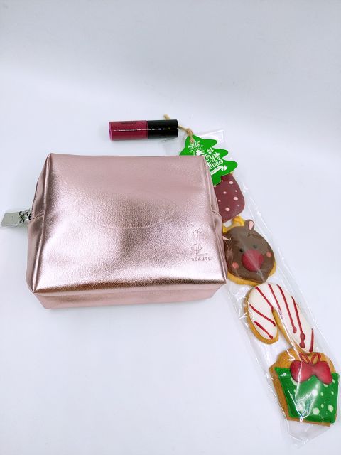 Clutch đựng mỹ phẩm cầm tay Ysl màu rose gold sang chảnh