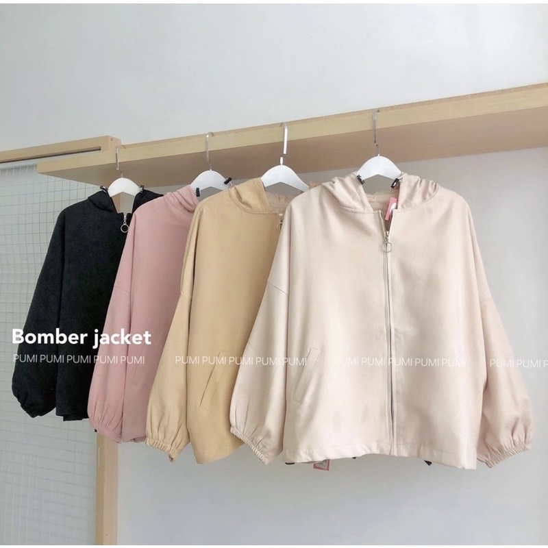Áo khoác nhung nữ tay và eo bo thun 2 túi trước nhiều màu freesize Pumi