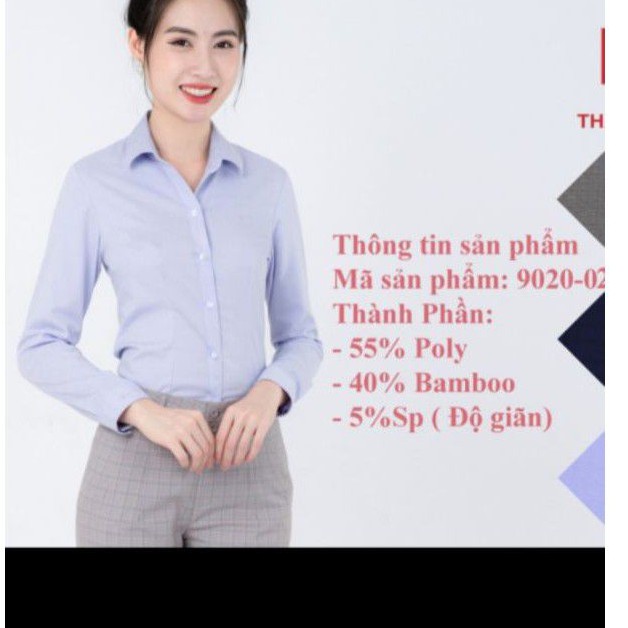 áo sơ mi nữ Thái Hoà vải sợi tre xanh dương nhạt.