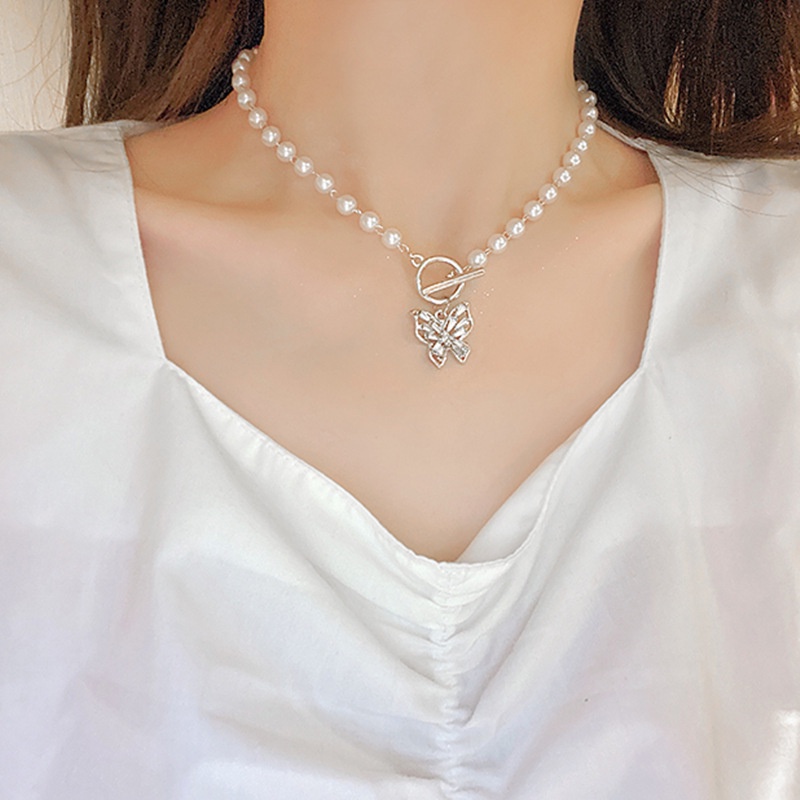 Vòng cổ ngọc trai nhân tạo mặt bươm bướm nữ