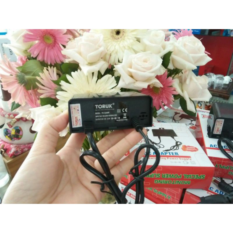 Bộ sạc 12V-2A TOUR,chống nước.Bảo hành 1 năm