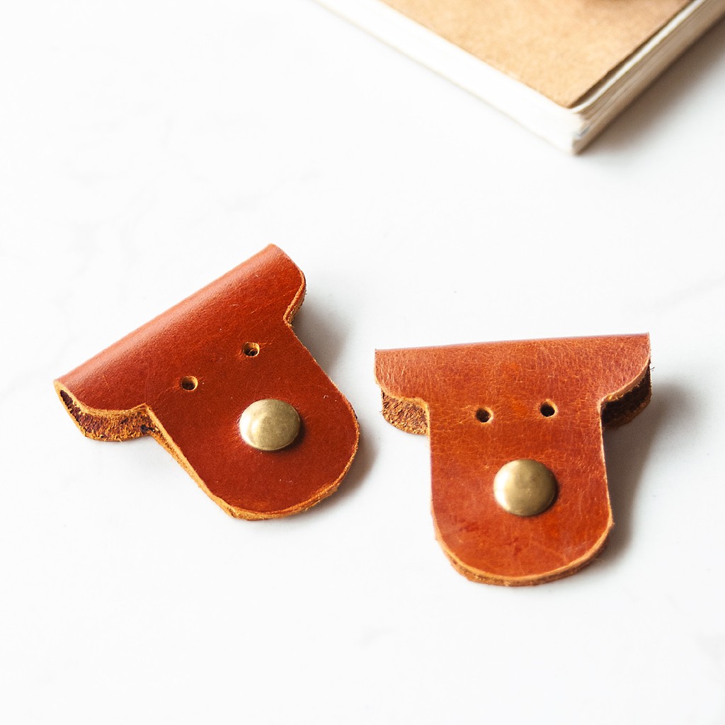 [SALES SỐC] Kẹp Tai Nghe Hình Cún Dễ Thương - Da Thật, Nút Bấm Xi Đồng Xịn - Mua 4 tặng 1 | BigBuy360 - bigbuy360.vn