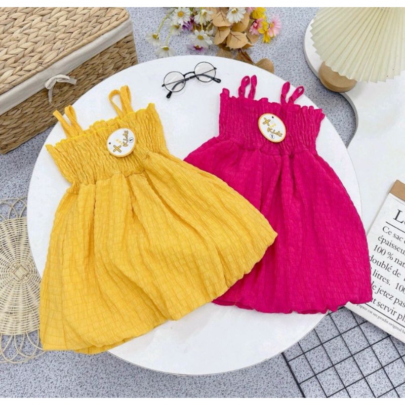 Đầm dây bí cho bé yêu
