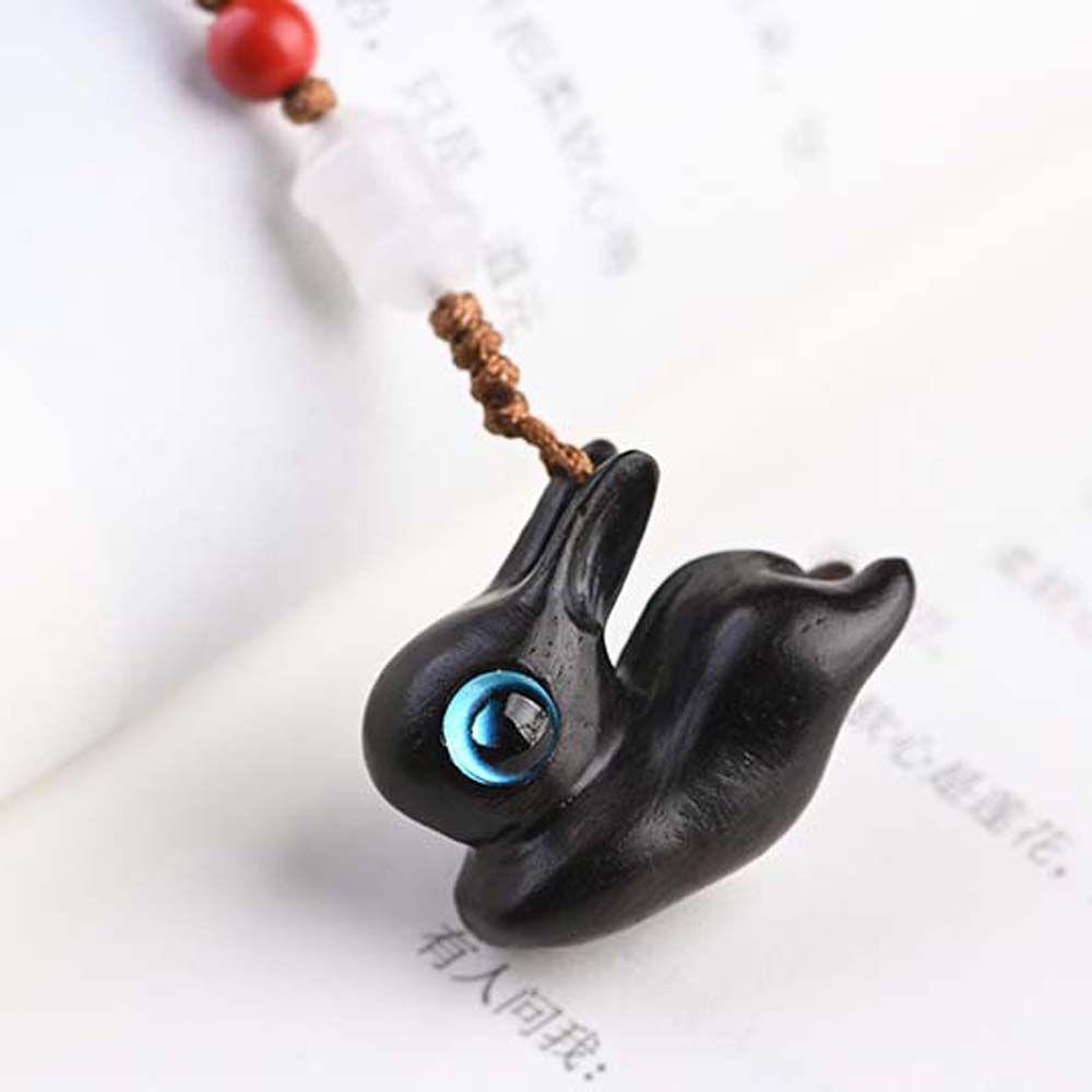 Móc Điện Thoại Bằng Gỗ Hình Thỏ Dễ Thương Chống Thất Lạc
