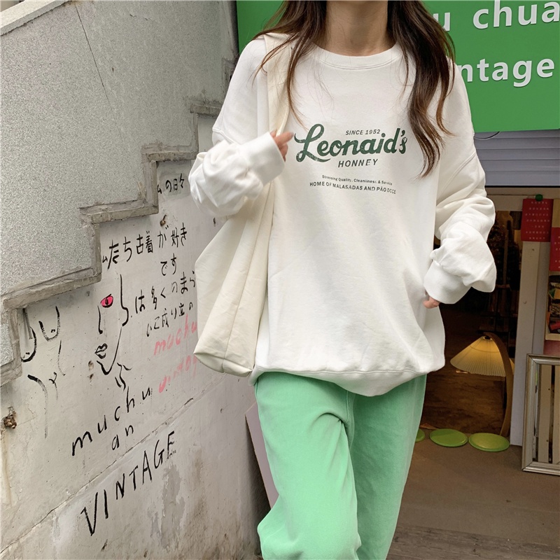 Áo thun sweater SUXI cổ tròn dài tay in chữ phong cách Hàn Quốc cho nữ