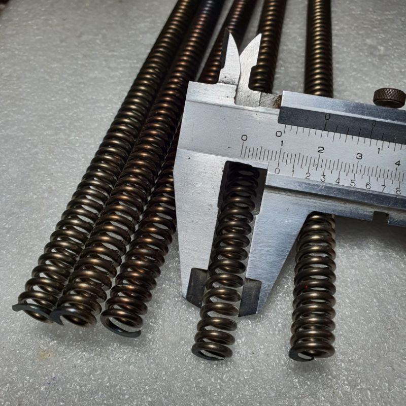 Lò xo nén 10*2*300mm