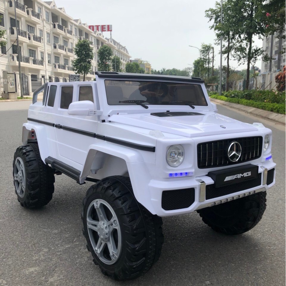 Ô tô xe điện trẻ em mẫu bán tải cho bé MERCEDES G650 cao cấp, 4 động cơ ắc qui lớn 12V7AH (Đỏ-Trắng) DH STORE