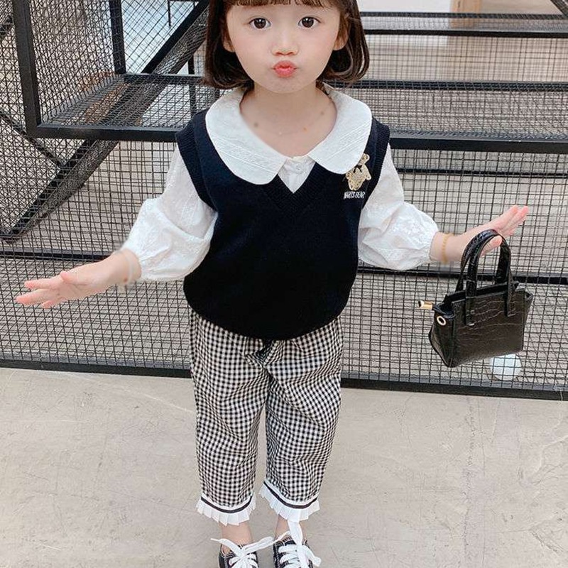Quần dài vải mềm họa tiết ca rô trắng đen thời trang thoải mái cho bé