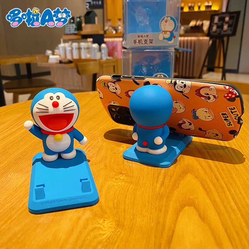 Kệ đỡ điện thoại Doraemon nhiều biểu cảm dễ thương chất liệu PVC chống xước, chống trơn trượt làm quà tặng, hàng ngày
