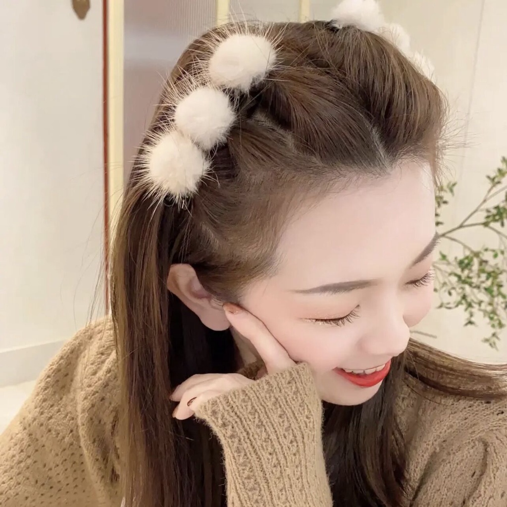 Kẹp tóc đính quả bông xinh xắn