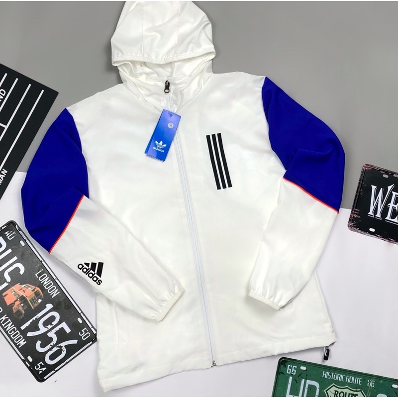 Áo Khoác Gió Nhẹ Nam Nữ 2 Lớp Có Mũ Chống Nắng Màu Xanh Trắng ADIDAS Thể Thao - Áo Khoác Dù Nam Nữ Form Xuông Có Dây Rút