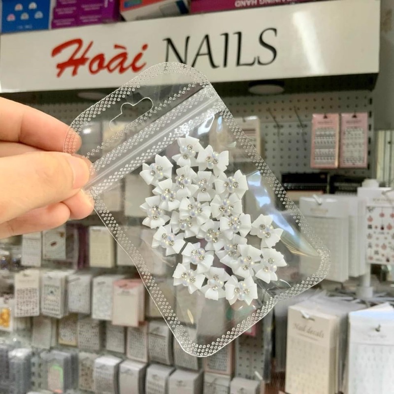 Nơ bột gắn móng nail