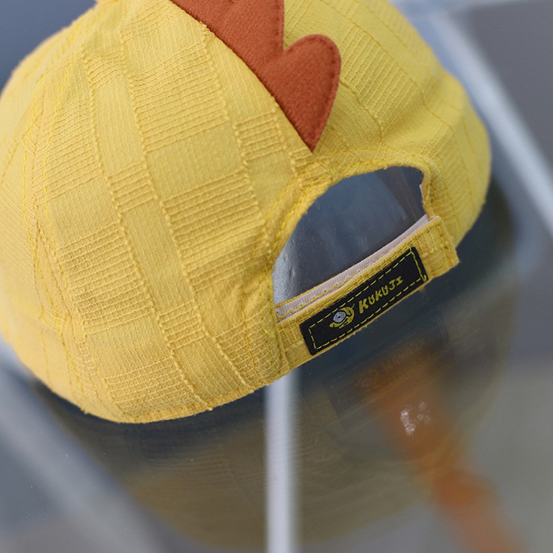 Nón bere khủng long vàng