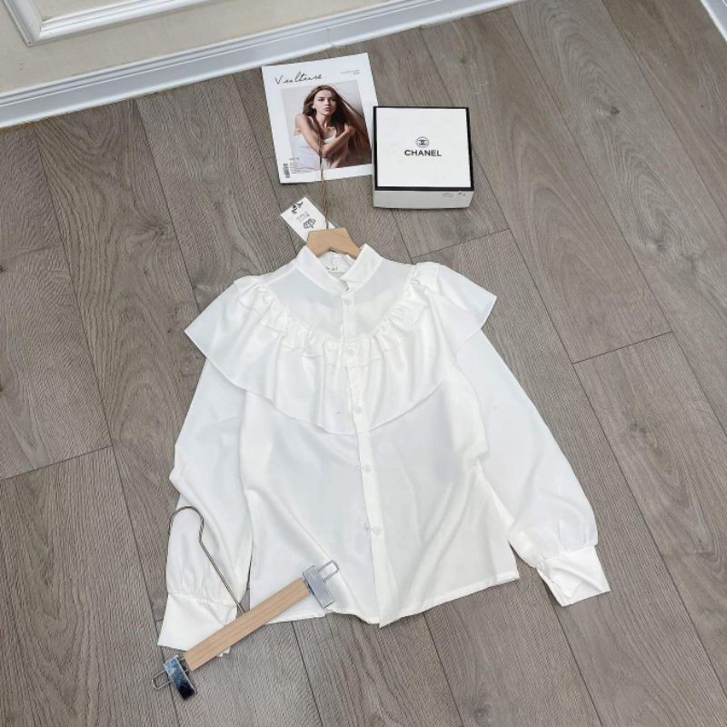 Áo sơ mi trắng nơ bèo tay dài xinh xắn.