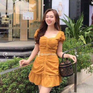 Đầm xếp ly đính nút